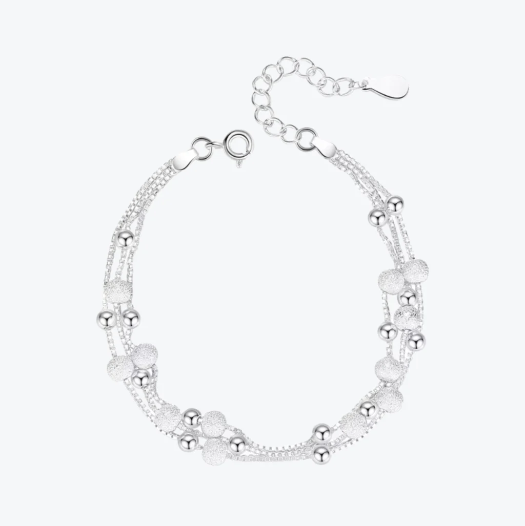 Pulsera Con Cuencas y Cadenas Entrelazadas
