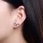 Aros corazón con infinito plateados modelo Aros corazón con infinito plateados modelo