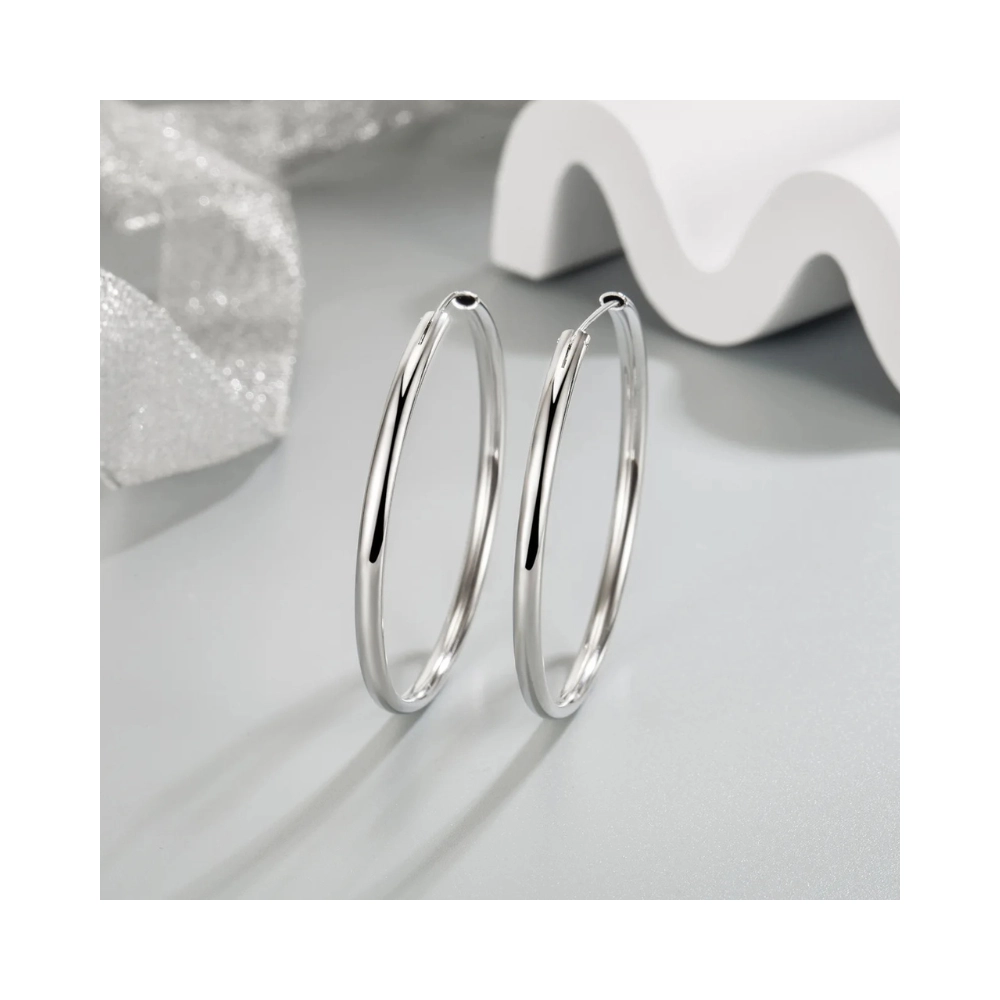 Aros plata argolla borde ovalado 40 mm modelo izquierda Aros plata argolla borde ovalado 40 mm modelo izquierda