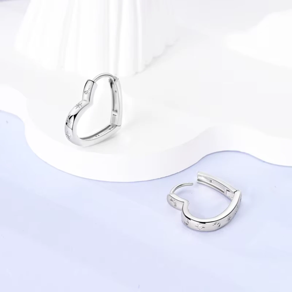 Aros plata corazon diseños luna y estrellas fondo Aros plata corazon diseños luna y estrellas fondo