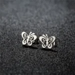 Aros plateados satinados mariposa fondo Aros plateados satinados mariposa fondo