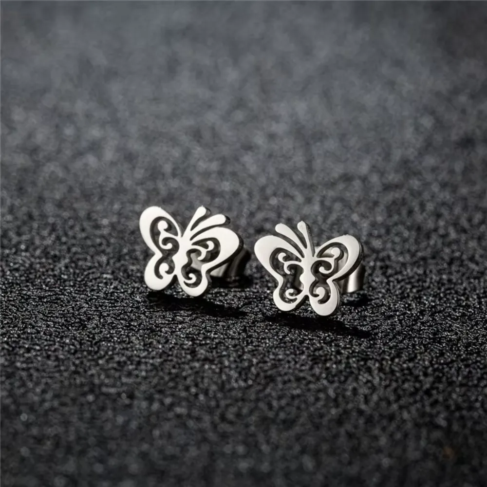 Aros plateados satinados mariposa fondo Aros plateados satinados mariposa fondo