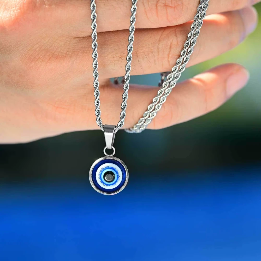 Collar-acero-tourbillon-con-amuleto-ojo-turco-mano Collar-acero-tourbillon-con-amuleto-ojo-turco-mano
