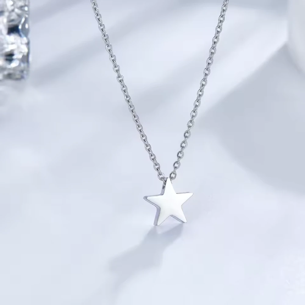 Collar estrella plateado de acero 45 cm fondo Collar estrella plateado de acero 45 cm fondo