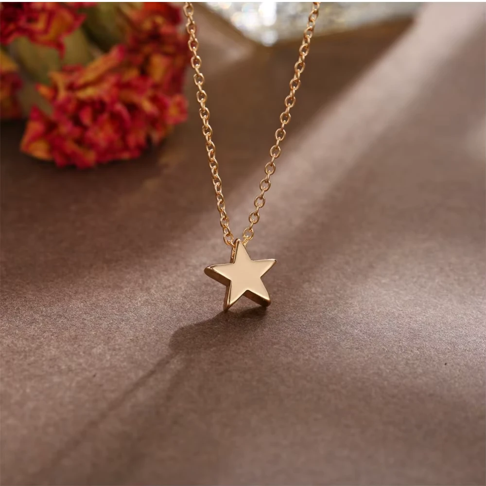 Collar con colgante de acero estrella dorado fondo Collar con colgante de acero estrella dorado fondo
