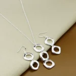 Conjunto collar y aros geométricos todo Conjunto collar y aros geométricos todo