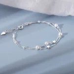Pulsera doble cadena con estrella plateada ajustable fondo Pulsera doble cadena con estrella plateada ajustable fondo