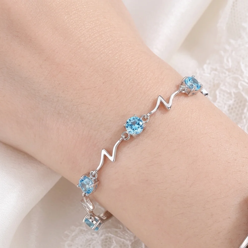 Pulsera plateada océano con circones celestes 17 cm detalles Pulsera plateada océano con circones celestes 17 cm detalles