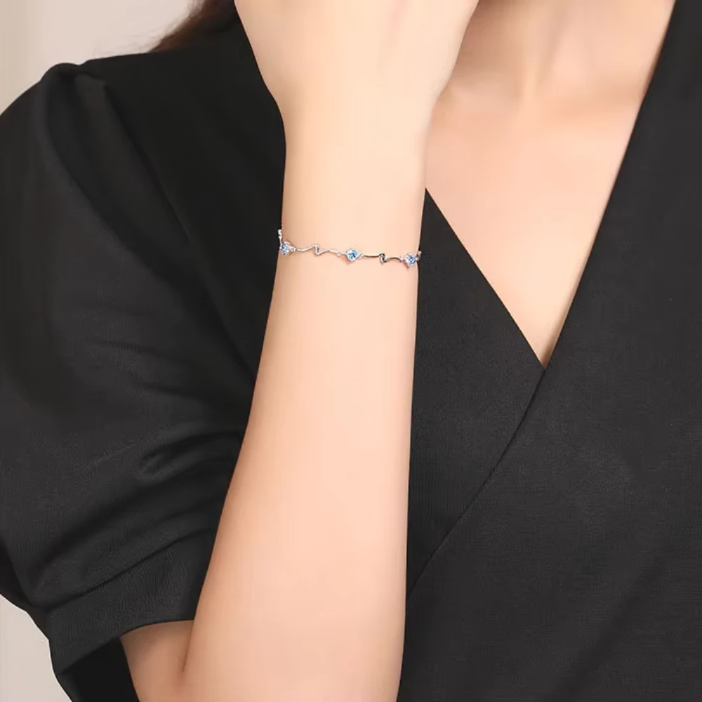 Pulsera plateada océano con circones celestes 17 cm mano Pulsera plateada océano con circones celestes 17 cm mano