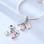 Dije viaje avión, maleta y pasaporte rosa pulsera Dije viaje avión, maleta y pasaporte rosa pulsera